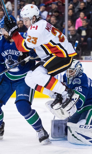 Pettersson scores in shootout, Canucks best Flames 4-3